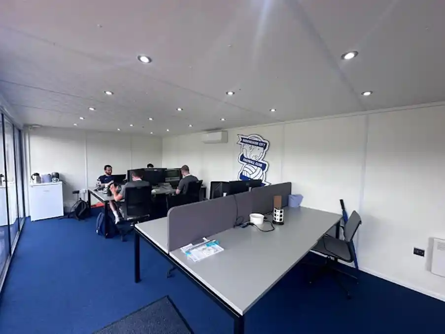 Portable cabin site office with steps and connected welfare facilities